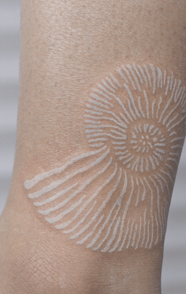 Ammonite White Ink Tattoo