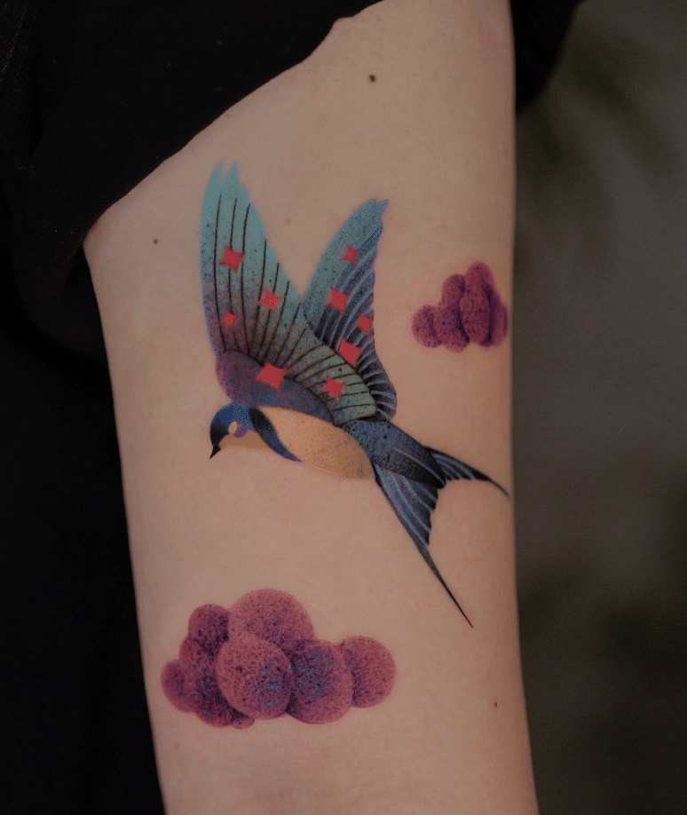 Arm With Swallow Tattoo