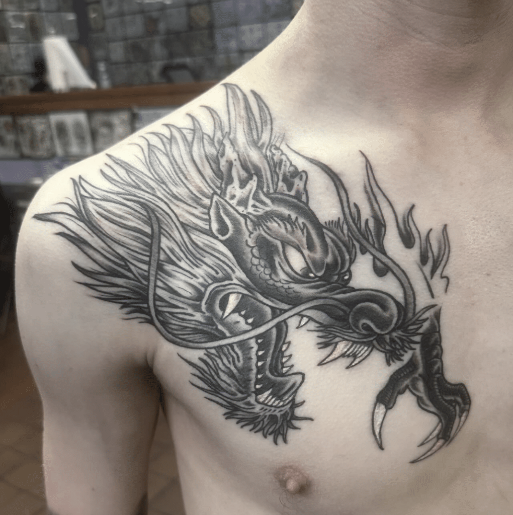 Black Dragon Tattoo On The Chest