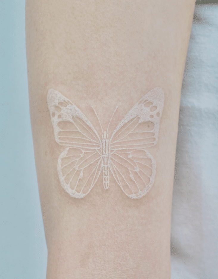 Butterfly White Ink Tattoo