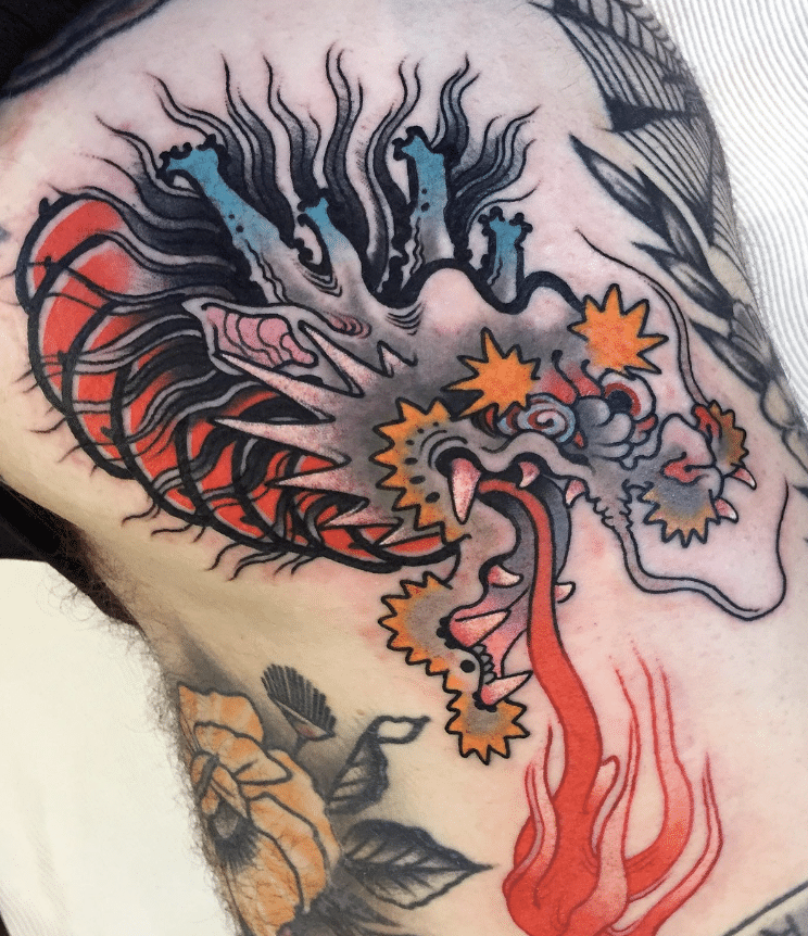 Crazy Dragon Head Tattoo