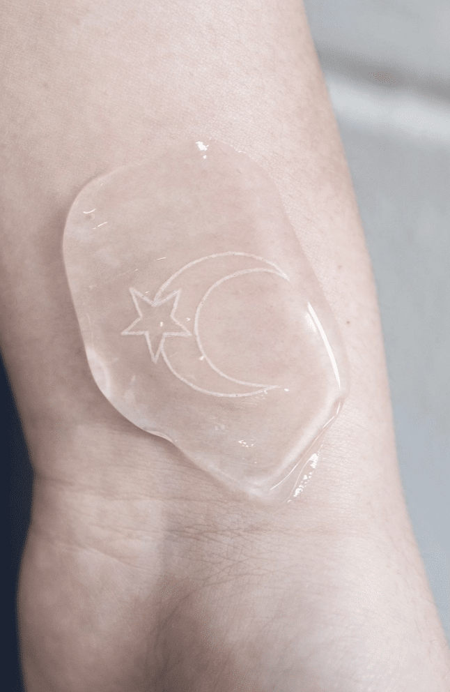 Crescent Moon White Ink Tattoo