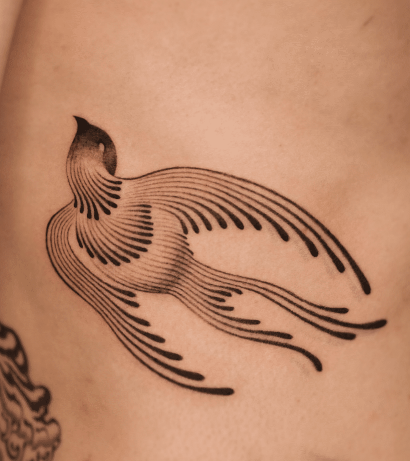 Custom Swallow Tattoo