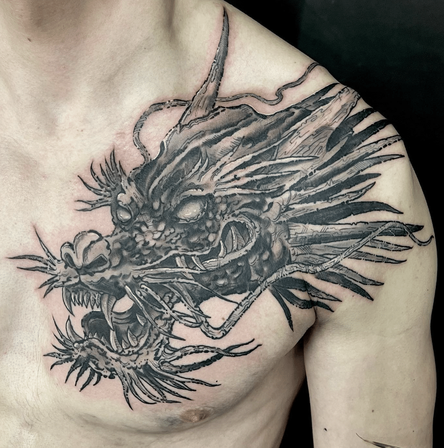 Dragon Head Tattoo On Chest