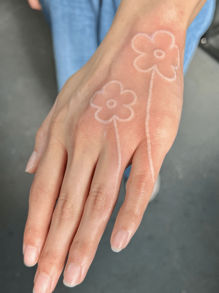 Flower White Ink Tattoo