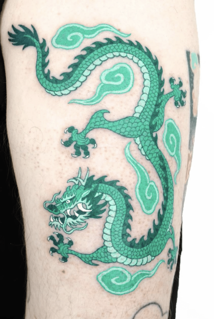 Green Dragon Tattoo On The Arm