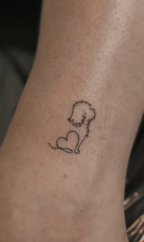 Leg With Dog Tattoo