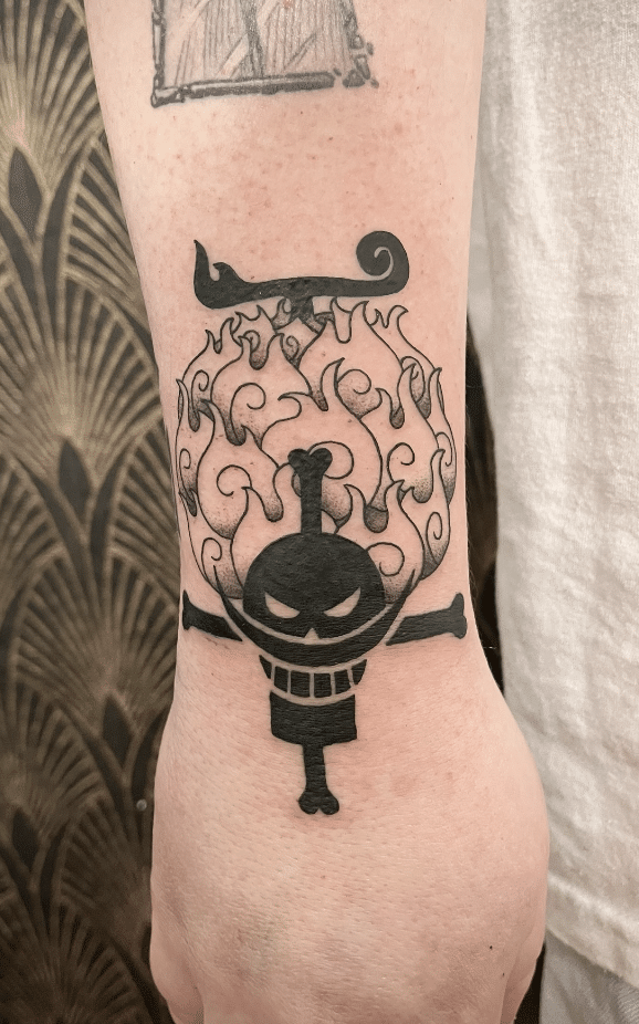 One Piece Tattoo On Wrist Idea