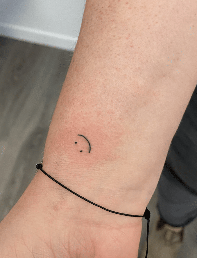 Smiley Face Tattoo