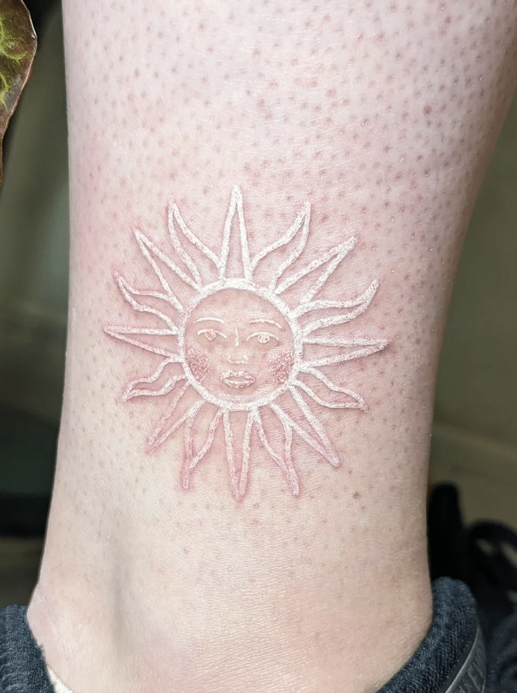 Sun White Ink Tattoo