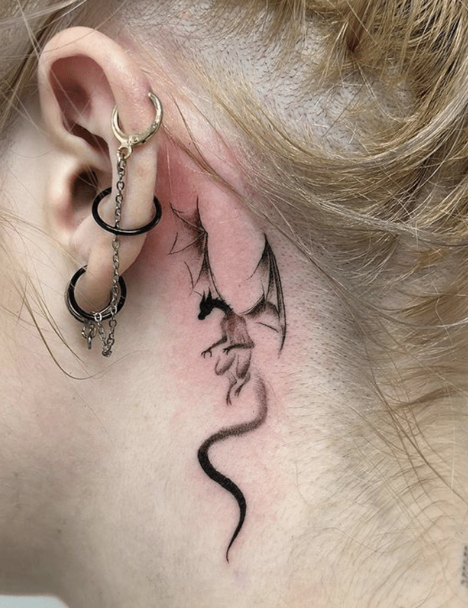 The Ear With Black Dragon Tattoo