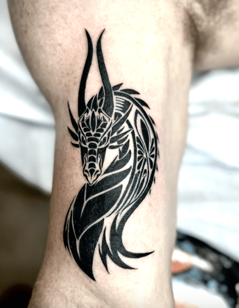 Tribal Black Dragon Tattoo