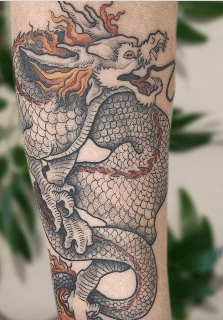 White Dragon Tattoo On The Arm Or Leg