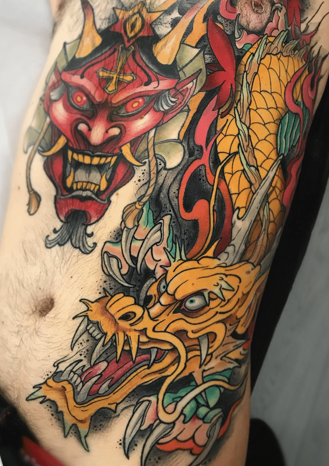 Yellow Dragon And Japanese Mask Tattoo