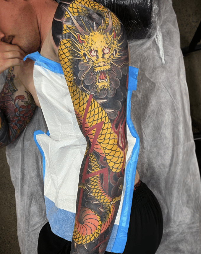 Yellow Dragon Tattoo Arm